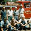 Enterprise firemen after taking delivery of their 1960 international fire truck, the truck was sold in December 2011 to Paul Froelich. Back row L-R Lloyd Smith, Unknown, Gene Fleagle, Walter Ernst, Cliff L'Hommedieu Front row Lester Jackson, Paul Jones, Unknown, Ernest Mulanax, Shorty Rutz